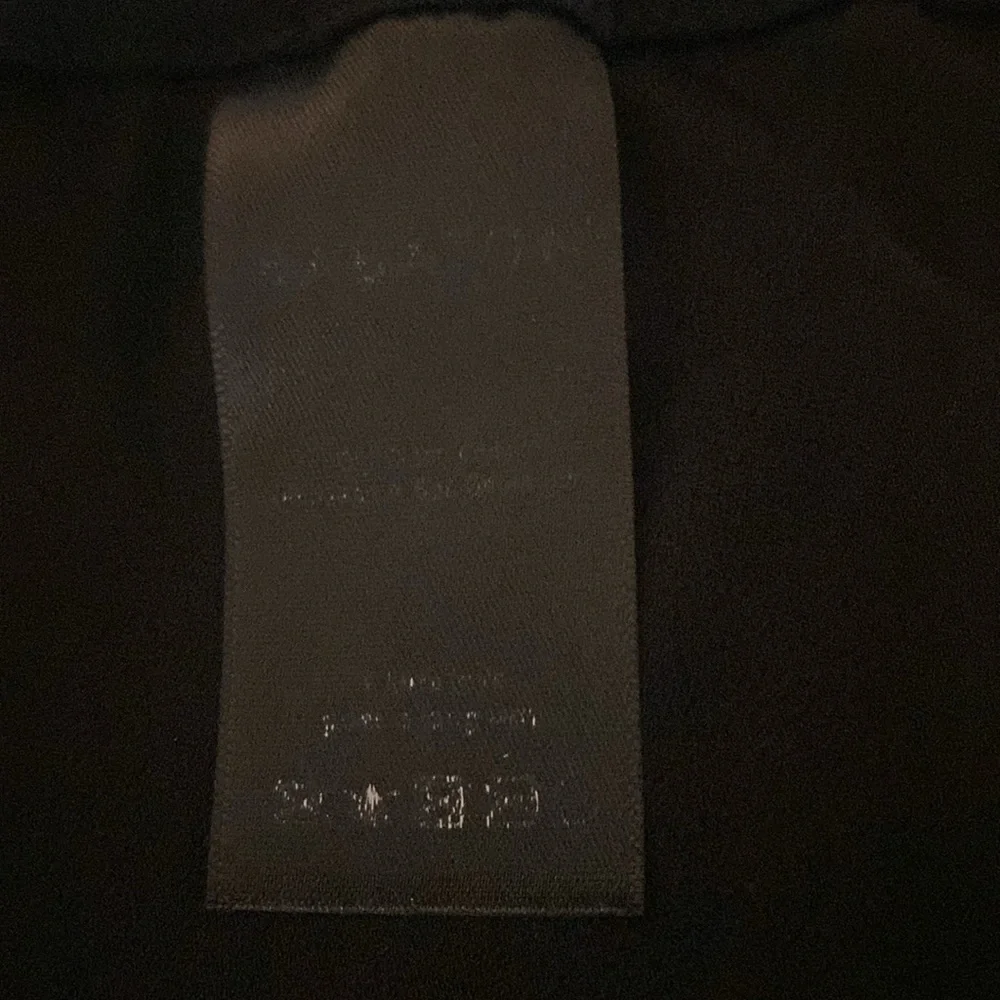 Aritzia Babaton stunning black trousers w/ stretchy waist w/ pockets.